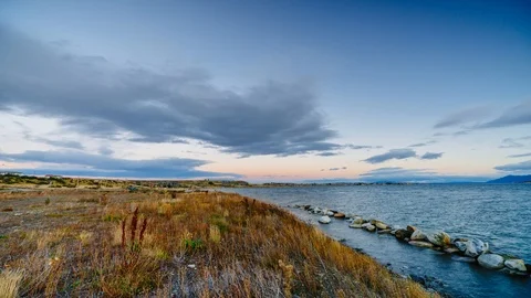 View on the bay during sunset at Puerto Natales . Autumn in Patagonia, the Chile Stock Footage 89506584