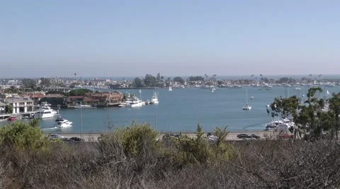View of bay with sandy residential penisula to the pacific ocean busy PCH Video stock 67555855