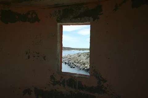 View of Bay Through Lighthouse Window Stock Photos