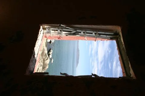 View of Bay Through Lighthouse Window Stock-Fotos