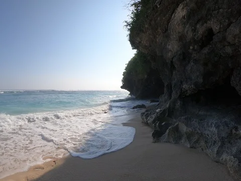 View of beach and cave at Green Bowl Beach, Bali Video stock 104009710