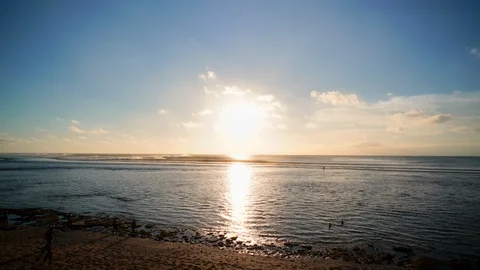 View of beach in Bali at sunset with beautiful color timelapse Stock Footage 124997046