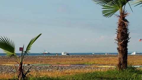  view of the beach, beach vacation, boats on the water. Resort place. Holidays a Stock Footage 204158162