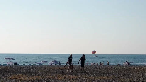 View of the beach, beach vacation, boats on the water. Resort place. Holidays at Stock Footage 204158295