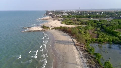 View of the beach with beautiful blue waves in the afternoon Stock Footage 289607194
