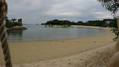 View from a beach on a bridge suspended by ropes Stock Footage 155886745
