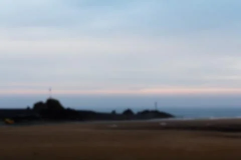 View from the beach in Bude, Cornwall Out of focus. Stock Photos