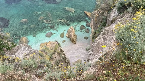 View of the beach with clear water in the bay. Stock Footage 329452336
