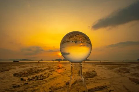 View of beach cloud at twilight inside crystal ball . Stock Photos