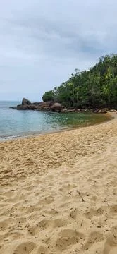 View of the beach on a cloudy day. Stock Photos