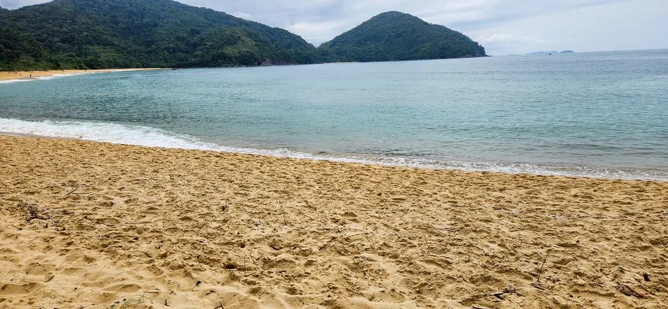 View of the beach on a cloudy day. Stock Photos