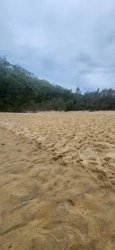 View of the beach on a cloudy day. Stock Photos