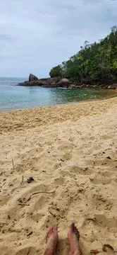 View of the beach on a cloudy day. Stock Photos