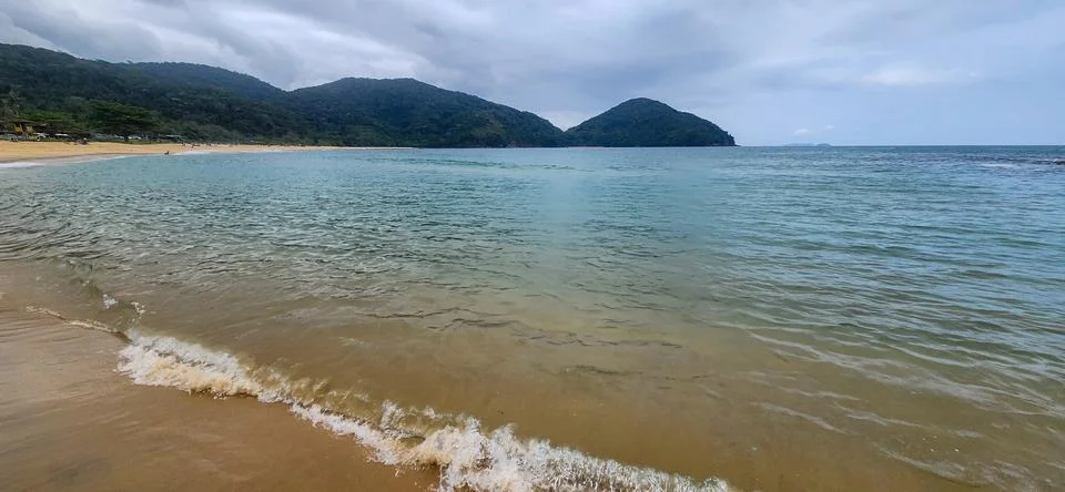 View of the beach on a cloudy day. Stock Photos