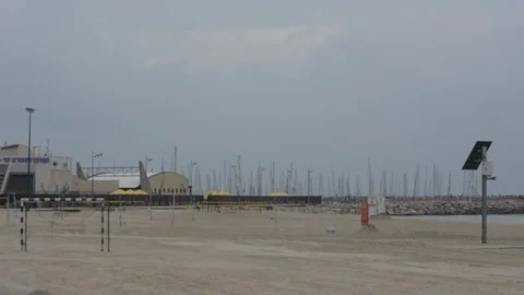 View of the beach with exercise equipment on a cloudy winter day Stock-Footage 258467061