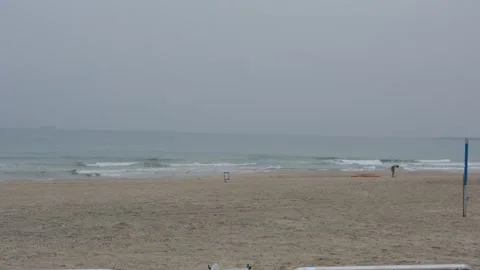 View of the beach with exercise equipment on a cloudy winter day Stock-Footage 258467159