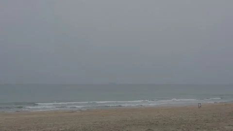 View of the beach with exercise equipment on a cloudy winter day Stock-Footage 258467319