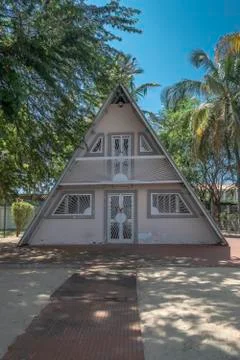 View of Beach house, with facade in triangle shape Stock Photos
