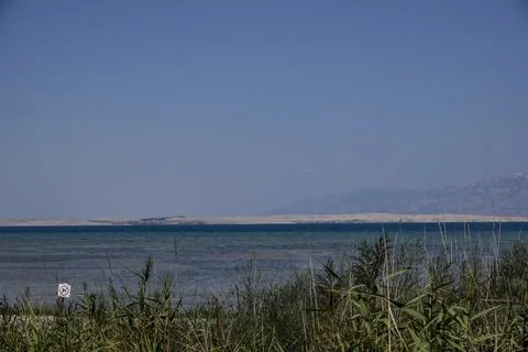 View the  beach with little waves Stock Photos