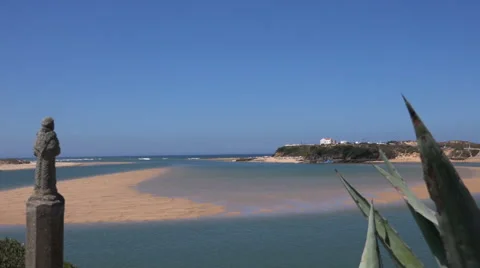 View of the beach at low tide in Vila Nova De Milfontes, Portugal Stock Footage 66029589