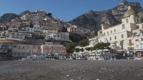 View from the beach on old architecture and Church of Santa Maria Assunta Stock Footage 108122200