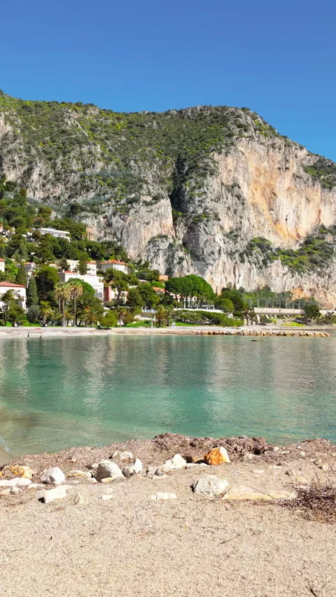 View of Beach Petite Afrique, in Beaulieu-sur-Mer, France. Vertical Stock Footage 281262333