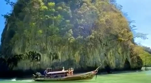 The view of the beach surrounded by the island Stock Footage 203934135