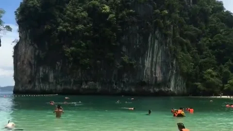 The view of the beach surrounded by the island Stock Footage 203934259