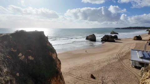 View of Beach of the Three Castles beach from the top of a cliff in Portimão Stock Footage 297218956