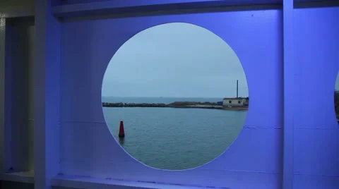 View of the beach through the porthole Stock Footage 60563577