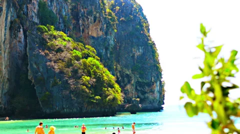 View from the beach on a tropical beach and a rock Video stock 36401673