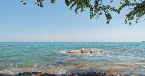 View of beach tropical Sandy and rocky shore Stock Footage 149643995