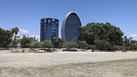 View from the beach of two Tall Buildings in Limassol Stock-Footage 91623022