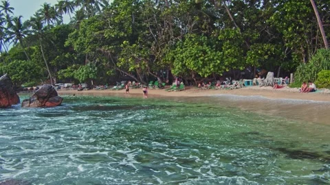View of the beach by vacationing tourists Stock Footage 241834554
