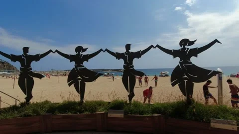 View of the beaches and the Monument a la Sardana in Blanes, Spain, Catalonia Stock Footage 250445608