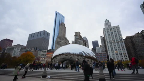 View of the Bean Cloud Gate in winter Chicago with a modern city high-rise Stock Footage 322088831