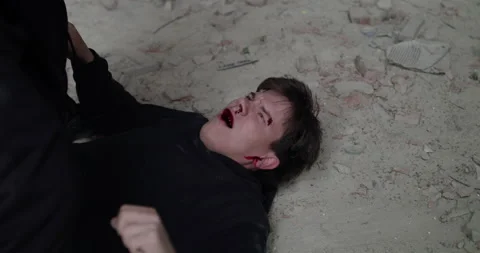 View of beating a man to blood by opponent and strangling him in building Stock Footage 131300698