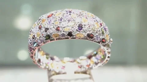 View of a beautiful Arabian ring, covered with multi-colored precious stones. Stock Footage 118674124