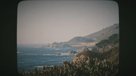 View of a beautiful Big Sur area from Highway One in California. Vintage Film Stock Footage 136731986