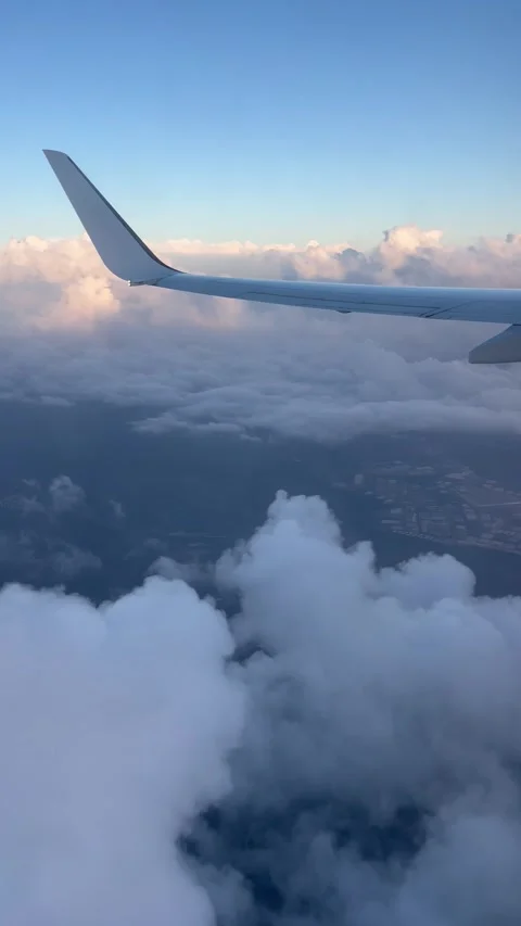 View of beautiful clouds from a plane window Stock Footage 336912552
