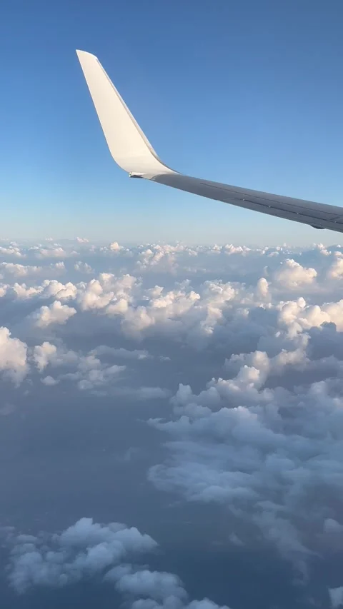 View of beautiful clouds from a plane window Stock Footage 336912846