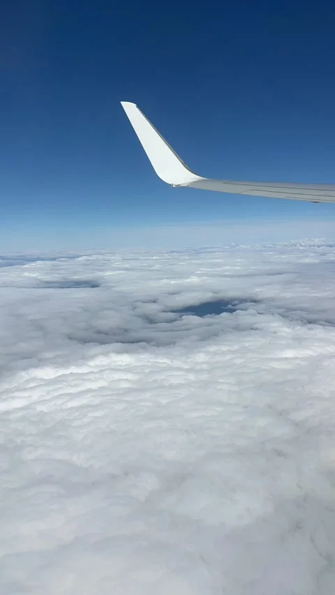 View of beautiful clouds from a plane window Stock Footage 336912864