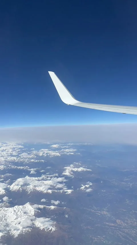 View of beautiful clouds from a plane window Stock Footage 336912957