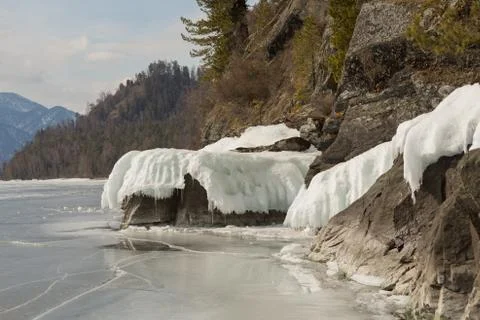 View of beautiful drawings on ice from cracks on the surface of lake Teletsko Stock Photos