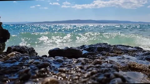 View of beautiful footage while calm sea waves breaking on the coastline Stock Footage 210174605
