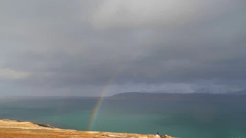 View Of Beautiful Full Rainbow As Storm Passes In Iceland 4 Stock Footage 87491335