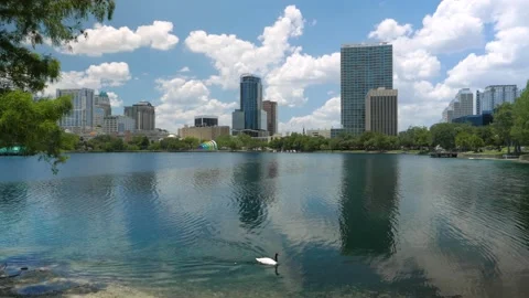 View Of A Beautiful Lake Eola Park in Orlando, Florida During A Summer Sunny Day Stock Footage 142083733