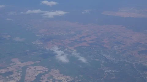 View of beautiful landscape of earth from the window. Passenger plane flies Stock Footage 312337384