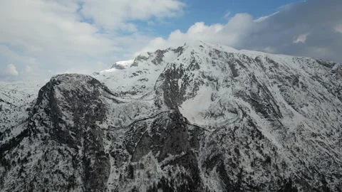 View a beautiful mountain range with snow during winter Stock Footage 262652088