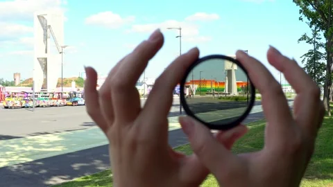 View of a beautiful multi-colored building through round tinted glass. Stock-Footage 201097207
